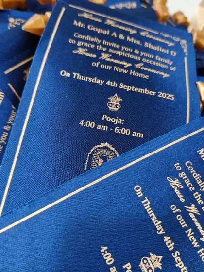 This royal scroll invitation is crafted from rich blue satin, offering a classic and unforgettable way to announce a significant event. It's a timeless choice for housewarmings, weddings, or any grand ceremony.