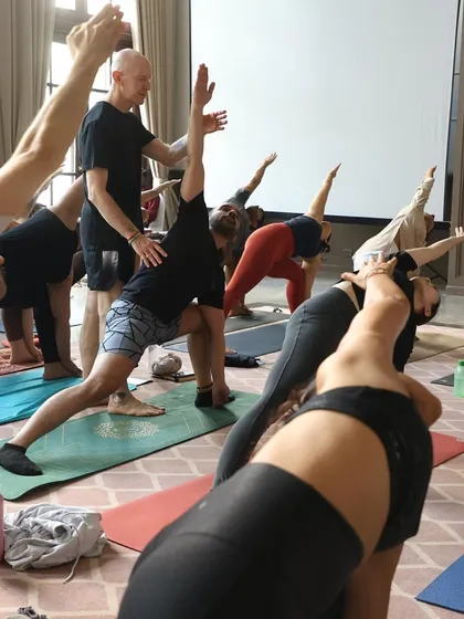 Eddie Stern providing adjustments during the Asana Sangraha practice. His guidance helped students find deeper alignment and understanding in each posture.