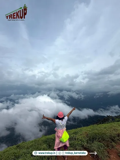That moment when you reach the summit, with the clouds below you and endless green all around. This is the kind of freedom and happiness I want everyone to experience on my treks.