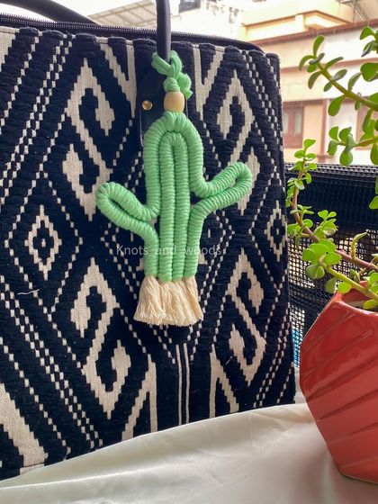 For all the plant lovers out there, I made this adorable cactus macrame keychain! 🌵 It's a quirky and fun accessory that adds a bit of personality to your belongings. These are super popular as unique, small gifts.
