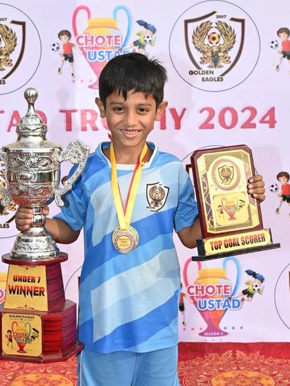 Sidhanta Biswas, our top goal scorer, with his well-deserved awards from the Chote Ustad Trophy. We celebrate the specific skills that lead to victory.