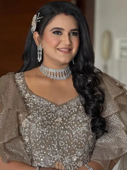 Another beautiful portrait of the bride on her reception night. Her smile shows how confident and happy she feels in her glamorous look.