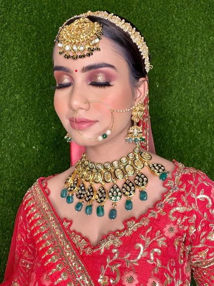 The eyes tell a story. This shot with her eyes closed highlights the beautiful golden shimmer and winged liner that make this bridal look so captivating.