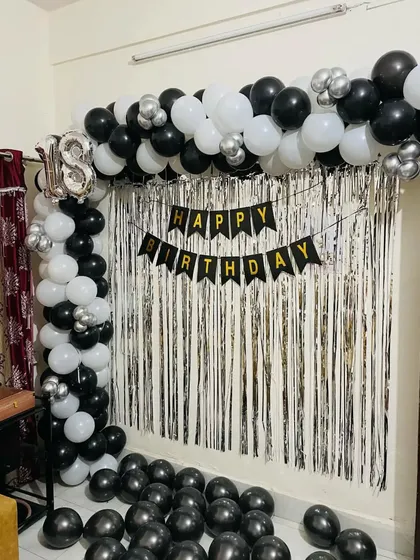 Another angle of the black and white 18th birthday home decoration.
