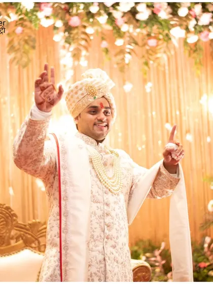 Another fantastic shot of a joyful groom, celebrating his big day. We make sure the groom gets his share of the spotlight with fun, dynamic portraits.