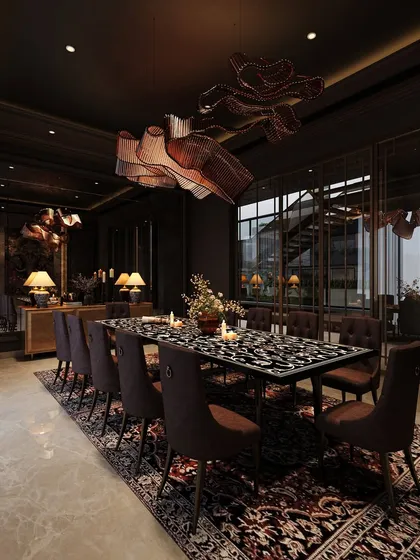 A moody and dramatic dining room concept, where a dark color palette is paired with a sculptural table, ornate rug, and a statement chandelier to create an immersive and luxurious experience.