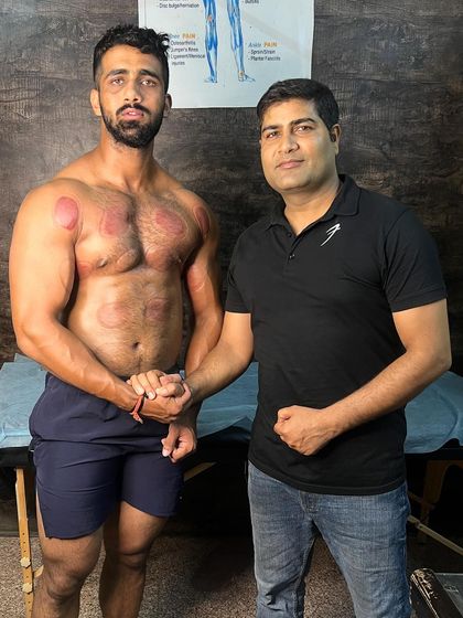 With professional athlete Nitin Yadav after his therapy session.
