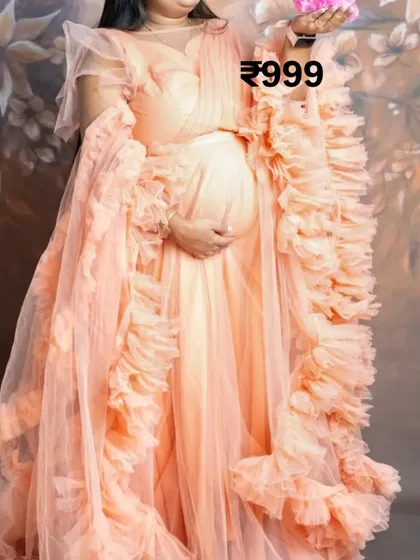 A great deal on one of my popular maternity gowns. This peach-colored ruffle gown is perfect for creating a soft and romantic look for your photoshoot.