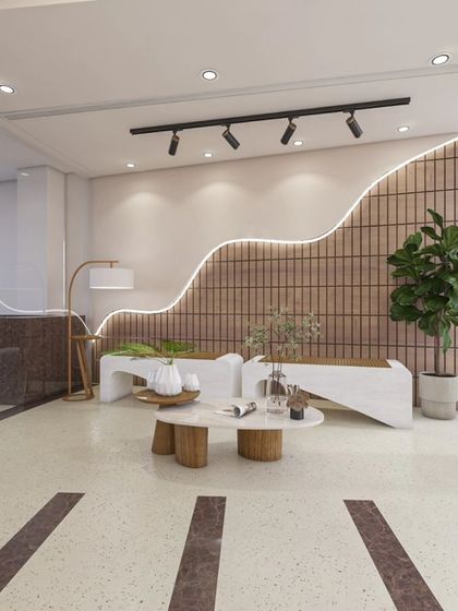 This club features a modern and minimalist design with flowing curves. We used a neutral color palette, terrazzo flooring, and unique lighting to create a chic and dynamic environment for recreation and socializing, including a dedicated game zone.