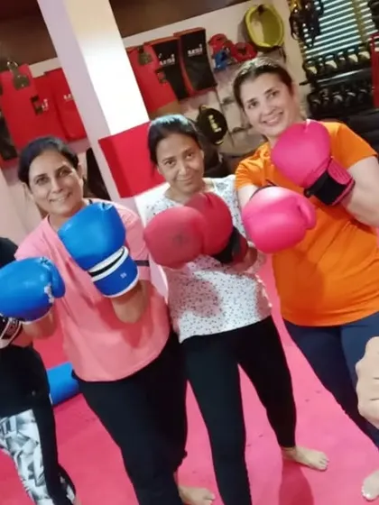 The coach with some of the proud members of our community fitness program.