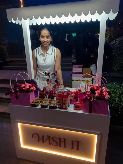 Here is our little stop and shop dream, all lit up and ready to welcome guests. I designed our gifting kiosk to be a beautiful and inviting centerpiece for any celebration. The glowing "WISH IT" sign is a beacon of warmth, promising a thoughtfully curated gift waiting inside.