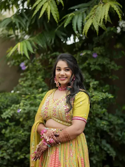 Another lovely portrait of the Haldi bride. The makeup is fresh and youthful, perfect for this fun-filled pre-wedding event.