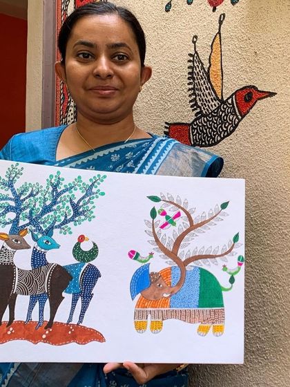 A student proudly holds her Gond artwork, which beautifully fuses animal and tree motifs. This animistic quality, where everything is interconnected, is a core philosophy of Gond art that we explore in our classes.