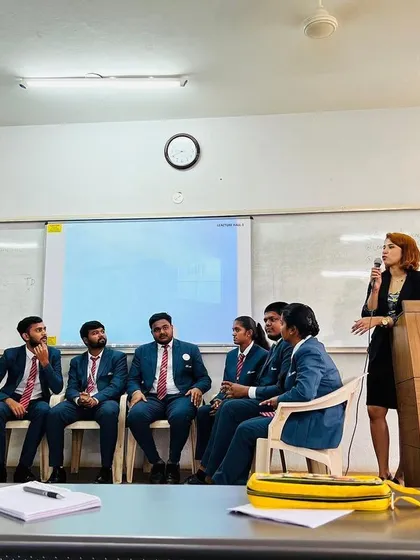 Guiding a group discussion exercise with MBA students. My goal is to create a dynamic environment where everyone can practice sharing ideas clearly and respectfully.