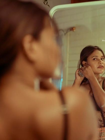 Another angle from the "getting ready" series, showing a different expression. I like to capture a sequence of moments to tell a complete story.