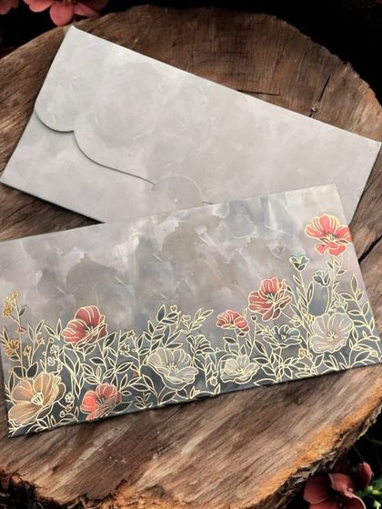 This floral money envelope with a grey watercolor background is a modern and elegant choice for any celebration.