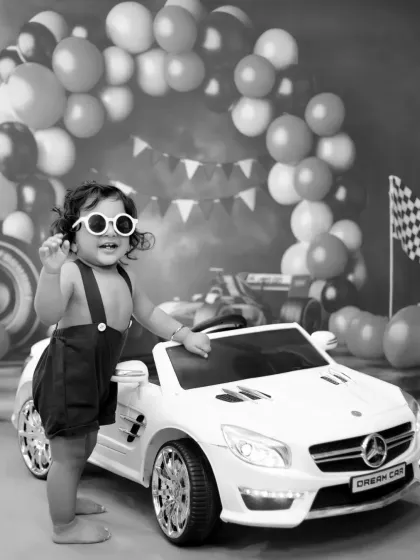 A cool and confident pose in black and white. This racer-themed shoot looks extra stylish in monochrome.