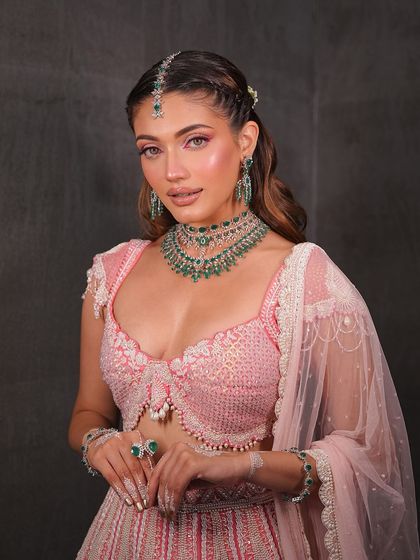 The full look. The pink and green color palette is fresh, modern, and perfect for a day wedding or mehendi.