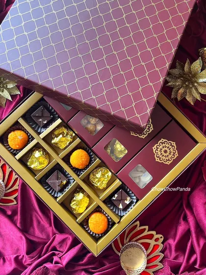 Another one of my premium Diwali boxes. This one features an assortment of truffles, including motichoor laddoo truffles, alongside foil-wrapped chocolates and nuts.