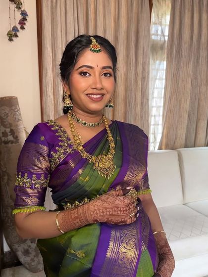 The perfect radiant look for Bhavika's Seemantham. I used warm tones and a skin-like finish to give her a natural glow that complemented her vibrant purple and green saree.