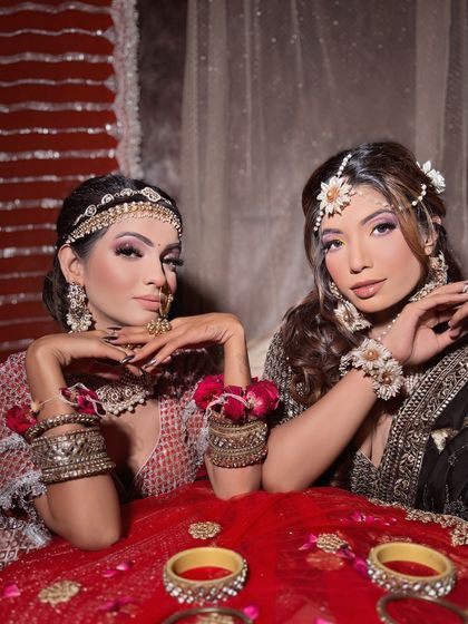 Two brides, two beautiful looks. A snapshot from a portfolio shoot, showing the variety of styles we teach.