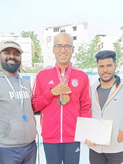 Ray Center - Competitive Swim Training Our Champions: A Legacy of Medals photo 14