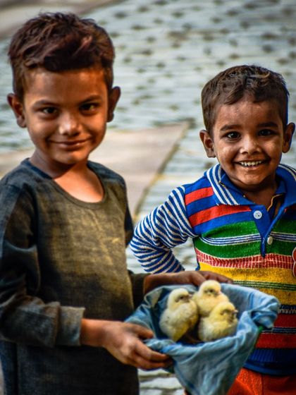 I stumbled upon these two boys who were so proud of their little chicks. It was a beautiful, spontaneous moment of childhood innocence and friendship that I was lucky to capture.