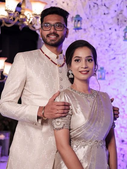 A beautiful couple portrait. Both the bride and groom look polished and perfect for their reception.