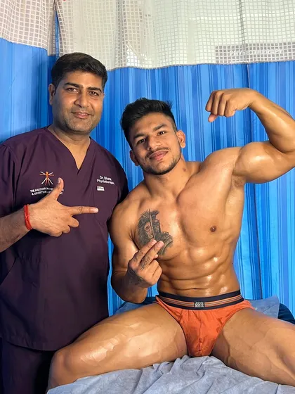 With wrestler Ashwani, who is feeling strong after his treatment.