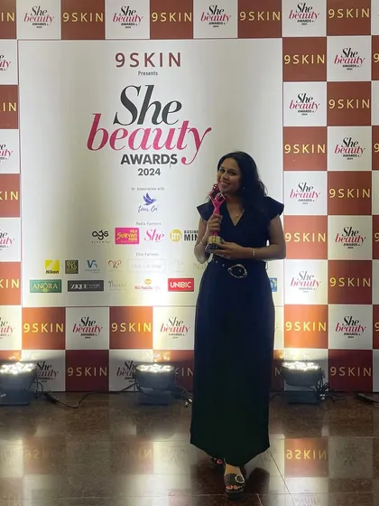 Another shot with my award. This milestone fills me with excitement for the journey ahead, and I am more determined than ever to continue creating beauty that inspires.