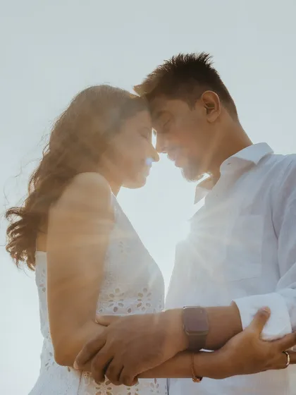 An intimate, sun-flared portrait from a pre-wedding shoot in Rishikesh. I love playing with natural light to create soft, emotional, and timeless couple photographs.