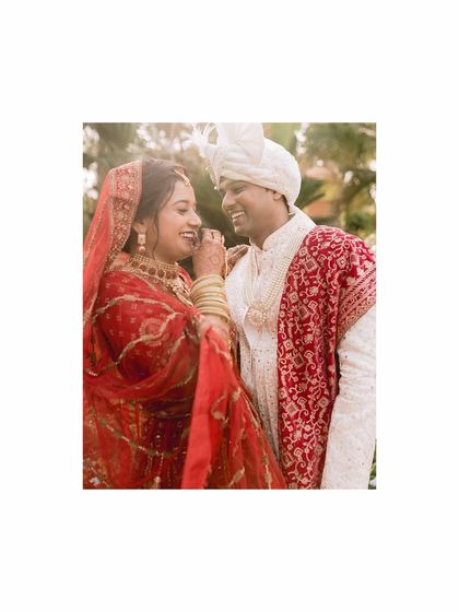 A candid, joyful moment between Aman and Saniya. Her hand gently on his face, their shared smiles, this portrait is full of warmth and genuine affection.