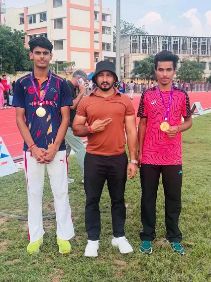 Gold is the only standard. Posing with two of my champion hurdlers after their win at the Open Delhi Athletics Championship. Their success is a testament to the relentless grind we put in day after day.