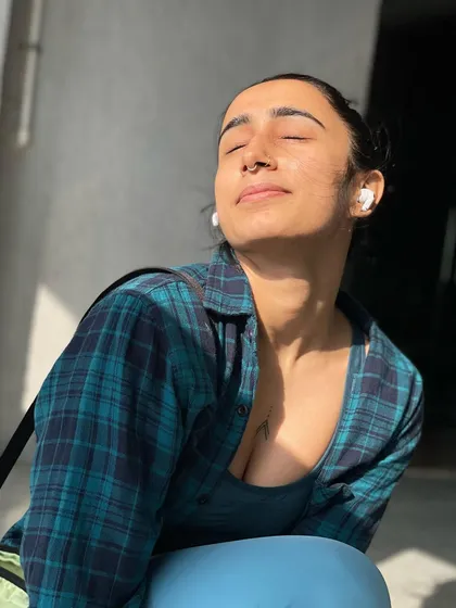 Enjoying a moment of peace with my eyes closed in the sun.