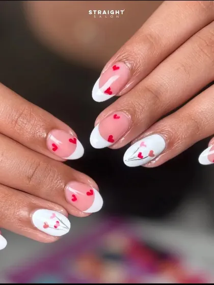 A clearer view of the tiny red hearts and the accent nail with a bouquet of heart "flowers." It's a lovely design for Valentine's Day or any romantic occasion.