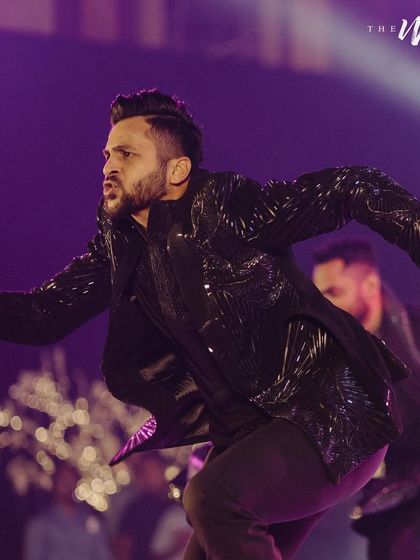 Capturing the high energy of the groom, Shardul Thakur, during his sangeet performance. We make sure our grooms are comfortable, confident, and ready to set the stage on fire.