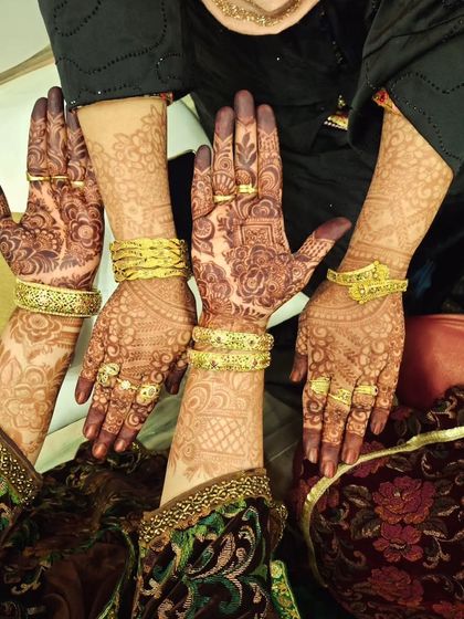 Another group shot celebrating the beautiful, dark henna stains.
