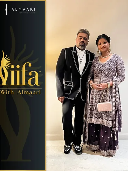 Here I styled choreographer Caesar and his partner for the IIFA awards. His standout black and white blazer is balanced by her elegant purple embroidered suit, showing how we style couples for major red carpet events.