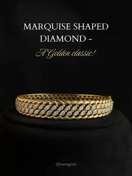 Golden classics never go out of style. This gold bangle, set with marquise-shaped diamonds, is a nod to tradition and a symbol of enduring grace that adds heritage to every look.