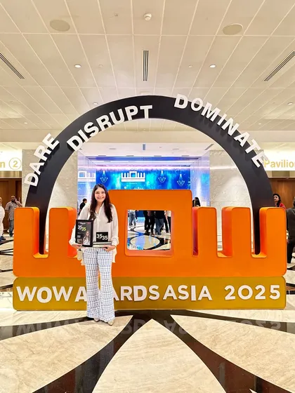 Posing with my award at the WOW Awards Asia, a celebration of excellence in the event and entertainment world.