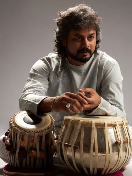 Another shot from the same studio session. The focused expression here reflects the dedication and years of practice that go into mastering the art of the tabla.