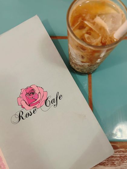 An iced coffee and the menu at Rose Cafe. This simple shot sets the scene and builds anticipation for the delicious meal to come.