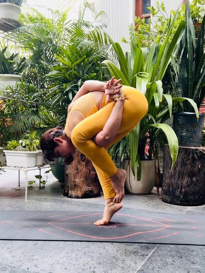 A challenging balancing pose, Baddha Garudasana (Bound Eagle Pose), that requires deep focus and stability. It is a physical manifestation of the Bhagavad Gita's wisdom: yoga is the journey of the self, to the self.