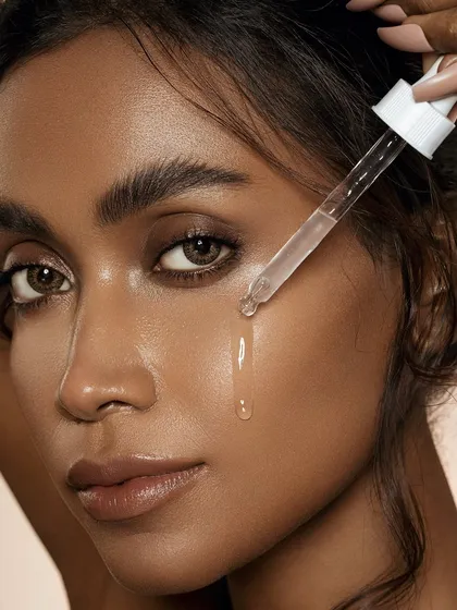 This shot captures the sensory experience of skincare. The delicate drop of serum illustrates hydration in motion, a key moment for any skincare campaign. We focus on making the product's texture and efficacy feel immediate and desirable.