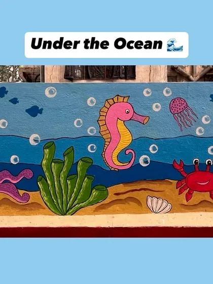 An 'Under the Ocean' themed mural, perfect for a child's bedroom or a pediatric clinic. It features friendly sea creatures like a turtle, octopus, and seahorse.