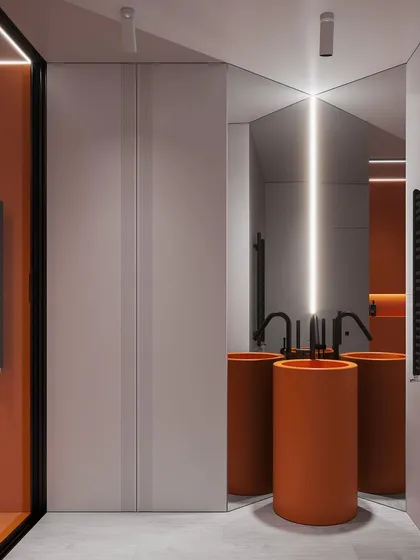This render shows the vanity area from the same modern bathroom concept. The cylindrical pedestal sinks in a matching orange hue act as a sculptural focal point, complemented by minimalist black tapware and strategic corner mirrors.