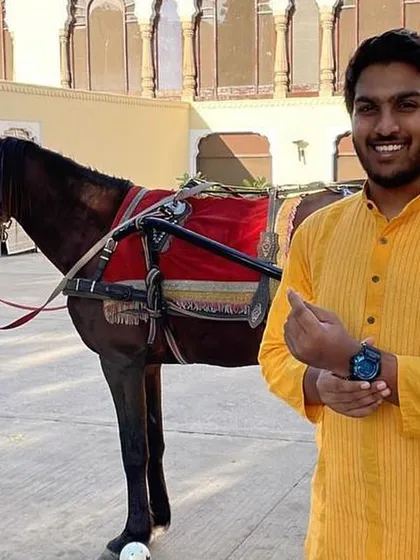 A fun moment captured during a destination wedding event. Sometimes you even get to pose with a horse!