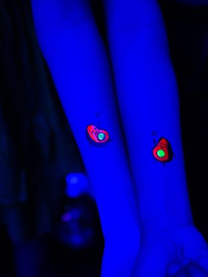 Guests can get glow-in-the-dark tattoos that come to life under the blacklights, adding to the interactive fun of the neon theme.