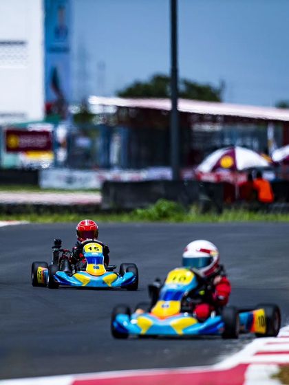 Two of our Micro drivers racing closely, honing their skills against each other in a competitive environment.