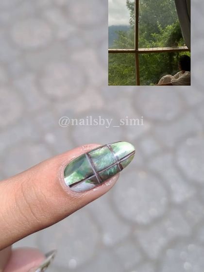 This nail art was inspired by a peaceful photo of someone looking out a window at a lush green view. I tried to capture that calm, serene feeling.